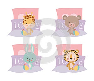 Set of cute babies animals in bed vector design