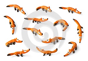 Set of cute foxs made of plasticine isolated on white background.
