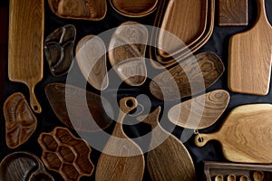 Set of cutting boards on wooden background