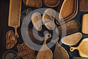 Set of cutting boards on wooden background