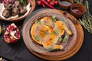 Set with delicious food on ethnic plates