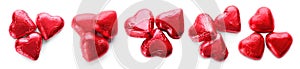 Set with delicious heart shaped chocolate candies wrapped in red foil on white background, top view. Banner design