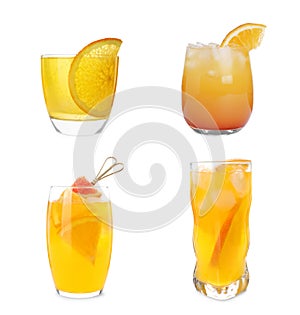 Set with delicious Mimosa cocktails on white background