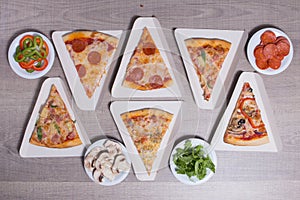 Set of delicious pizzas