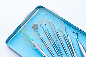 Set of dental tools equipment and Tooth extraction instruments on a tray