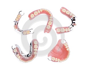 Set of dentures on white background