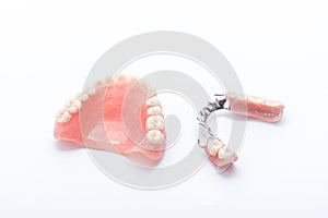 Set of dentures on white background