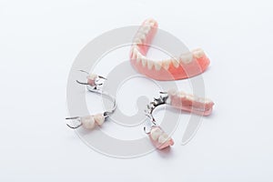 Set of dentures on white background