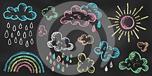 Set of Design Elements Rainbow, Sun, Clouds, Drops of Different Colors Isolated on Chalkboard Backdrop. Realistic Chalk Drawn