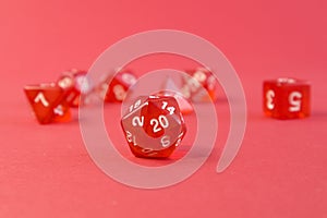 Set of dice for fantasy dnd and rpg tabletop games Board game polyhedral dices with different sides on red background