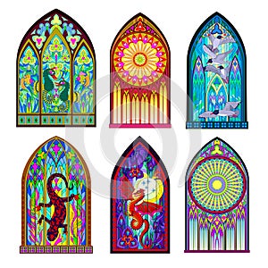 Set of different beautiful colorful stained glass windows in Gothic style. Middle age architecture in Western Europe.