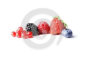 Set of different berries on a white background