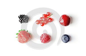 Set of different berries on a white background