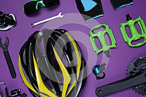Set of different bicycle tools, accessories and parts on background, flat lay