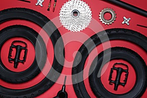 Set of different bicycle tools and parts on background, flat lay