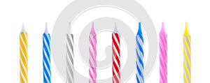 Set with different birthday candles on white