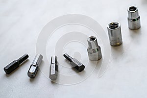 Set of different bits for screwdriver replaceable head