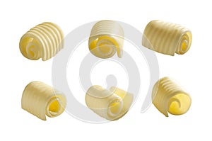 Set of different butter rolls or swirl or curls isolated on white background creamy soft butter