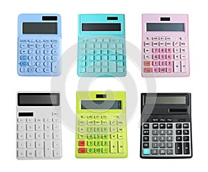 Set of different calculators on white background