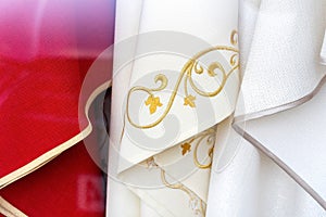 Set of different catholic church priest chasubles, vestments, traditional robes, priest`s religious clothing, clothes