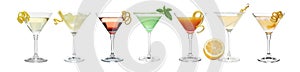 Set with different cocktails in martini glasses on white background