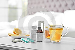 Set of different cold remedies on table