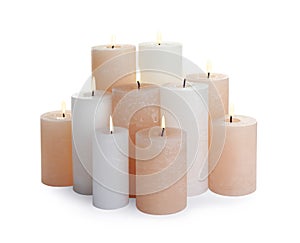 Set of different color candles on background