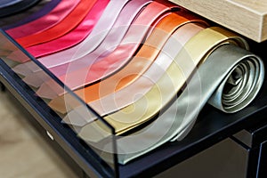 Set of different color skinny neckties in a men clothing store