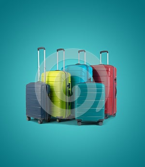 Set of different colored stylish suitcases for travel on blue background
