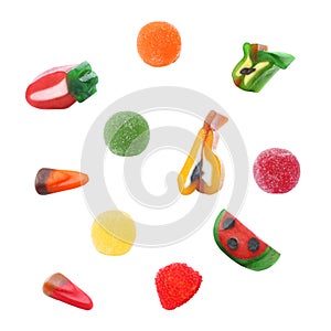Set of different colorful candies on white