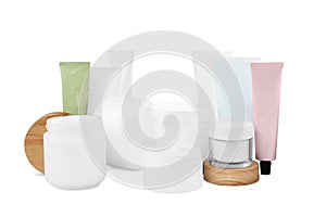 Set of different creams on white background