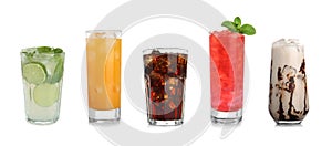 Set of different delicious cocktails with ice cubes on background