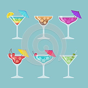 Set of different drinks and cocktails on blue background