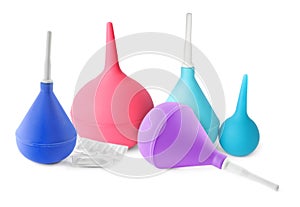 Set with different enemas on white background