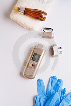 Set of different hardware equipment with oil. anti-age and anti-cellulite set for home skin care procedure. beauty concept