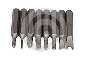 Set of different interchangeable bits for mini screwdriver, close-up