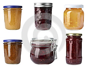 Set of different jars with jams on background