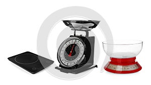 Set with different kitchen scales on white background