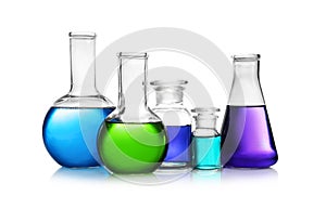 Set of different lab glassware with color liquid isolated