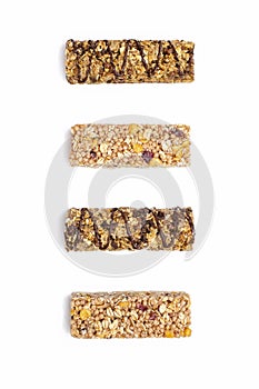 A set of different muesli bars on a vertical white isolated background
