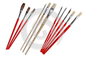 Set of different paint brushes with wooden handle isolated