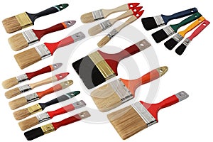 Set of different paint brushes with wooden handle isolated