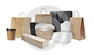 Set with different paper bags, containers for food and takeaway cups white background