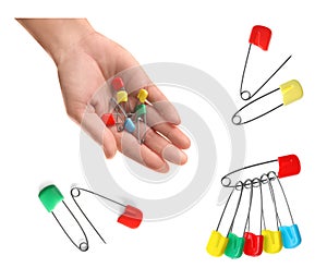 Set with different safety pins on white background