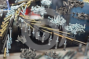 Set of different screws, nails, self-tapping screws and other metal parts for construction