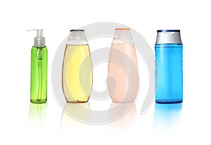 Set with different shower gels on white background