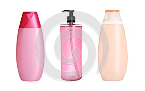 Set with different shower gels on white background
