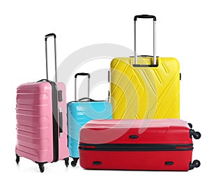 Set of different stylish suitcases for travelling on background