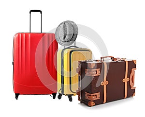 Set of different stylish suitcases for travelling on background