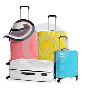 Set of different stylish suitcases for travelling on background